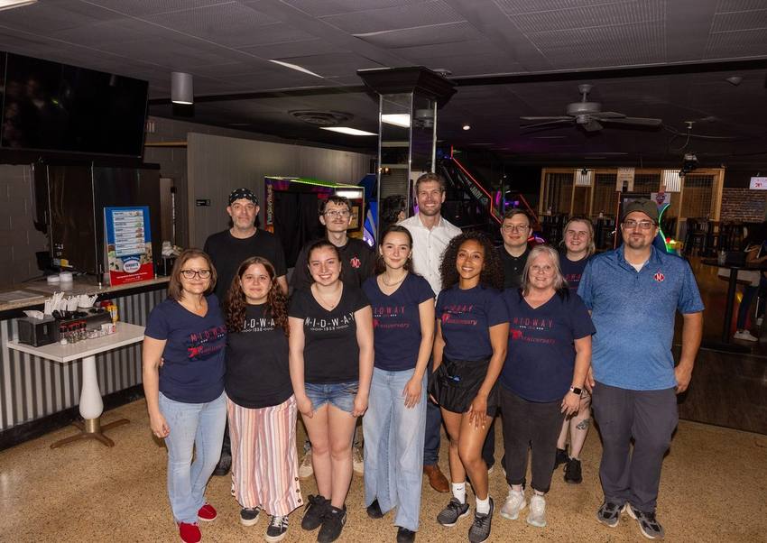 A group posing together on the lanes