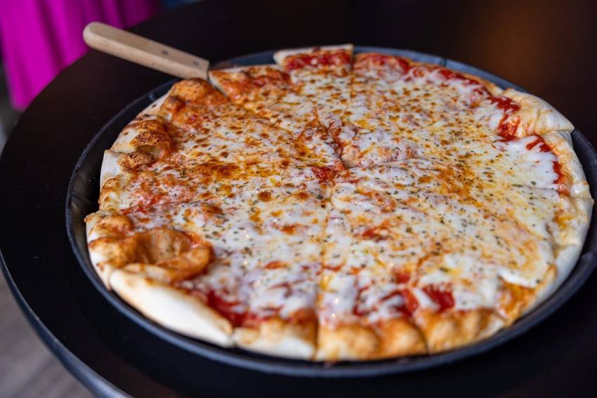 A fresh cheese pizza from the Midway kitchen